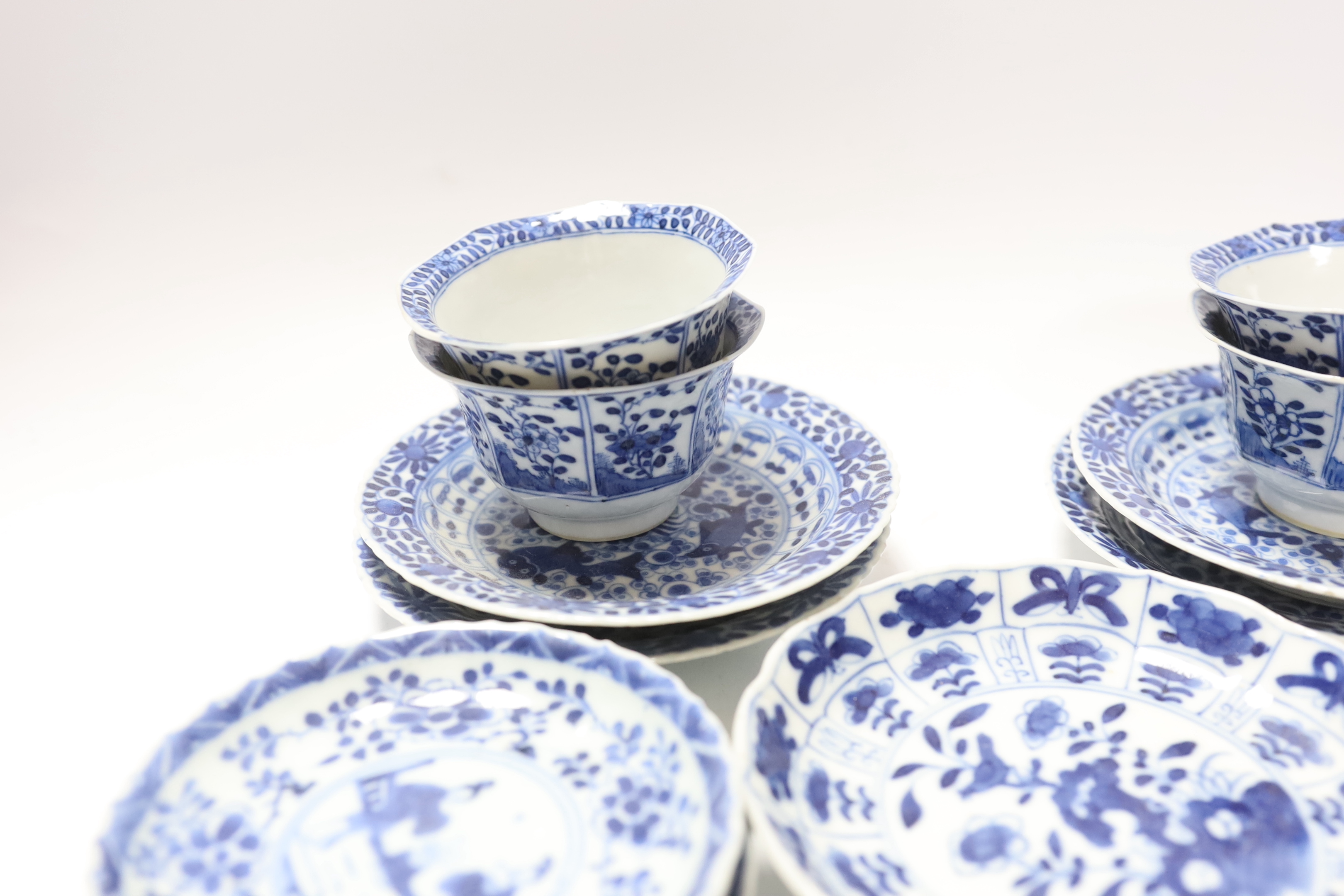 Two pairs of 19th century Chinese blue and white teabowls and saucers, a set of six other blue and white saucers, another and a teabowl, all 19th century (17)